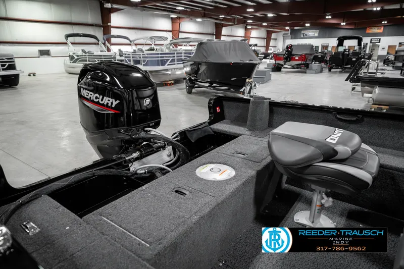 Slide: The Image of 2025 Lund 1650 Rebel XL SS boat with Mercury engine in showroom. - 28