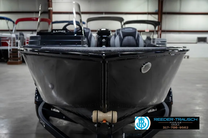 Slide: The Image of 2025 Lund 1650 Rebel XL SS boat in showroom, front view. - 3