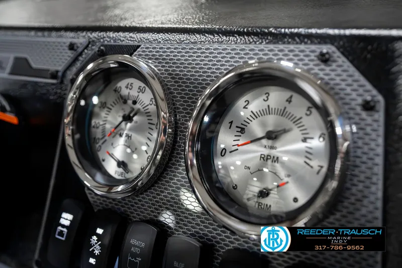 Slide: The Image of Dashboard of 2025 Lund 1650 Rebel XL SS boat with speedometer and RPM gauges. - 33