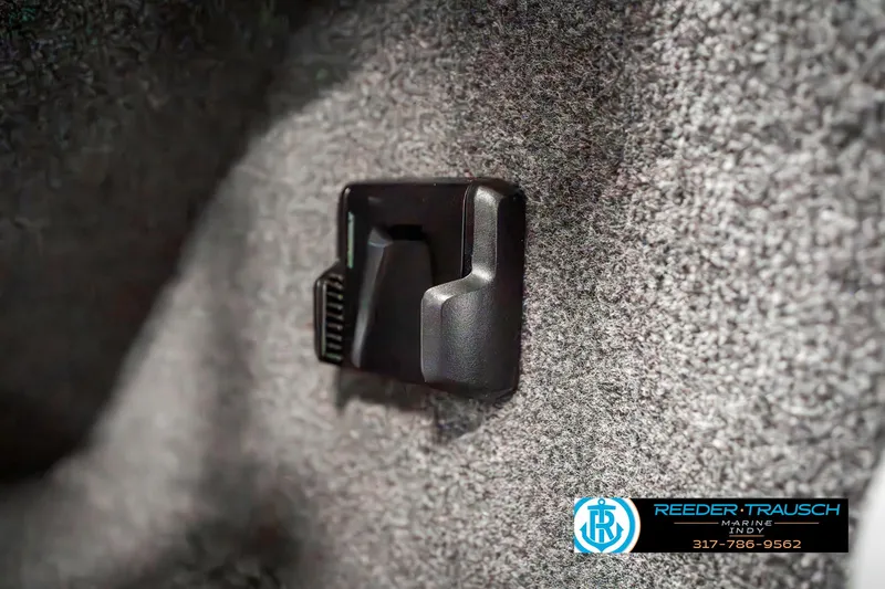 Slide: The Image of 2025 Lund 1650 Rebel XL SS interior detail with a mounted black clip. - 36