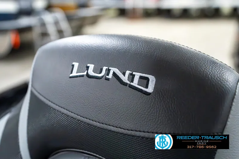 Slide: The Image of 2025 Lund 1650 Rebel XL SS boat seat with logo, close-up view. - 39