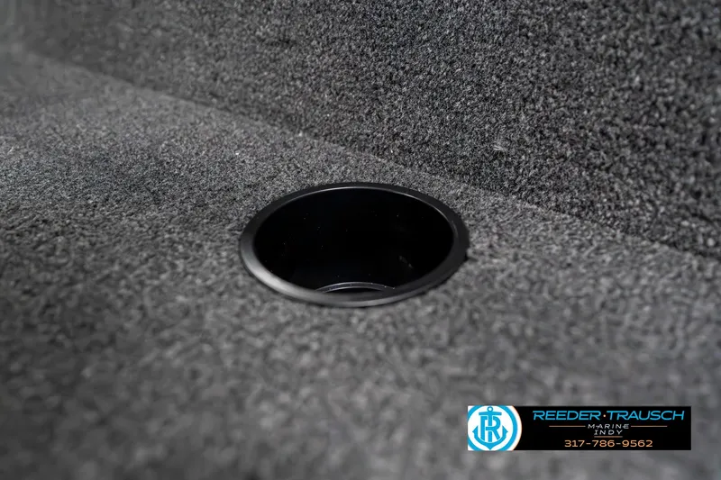 Slide: The Image of 2025 Lund 1650 Rebel XL SS boat interior with cup holder detail. - 42