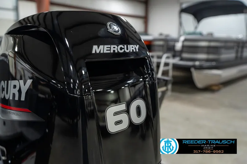 Slide: The Image of 2025 Lund 1650 Rebel XL SS with Mercury 60 outboard motor in showroom. - 46