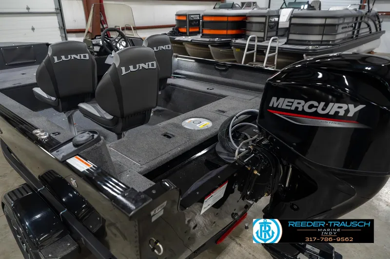 Slide: The Image of 2025 Lund 1650 Rebel XL SS boat with Mercury engine in showroom. - 49