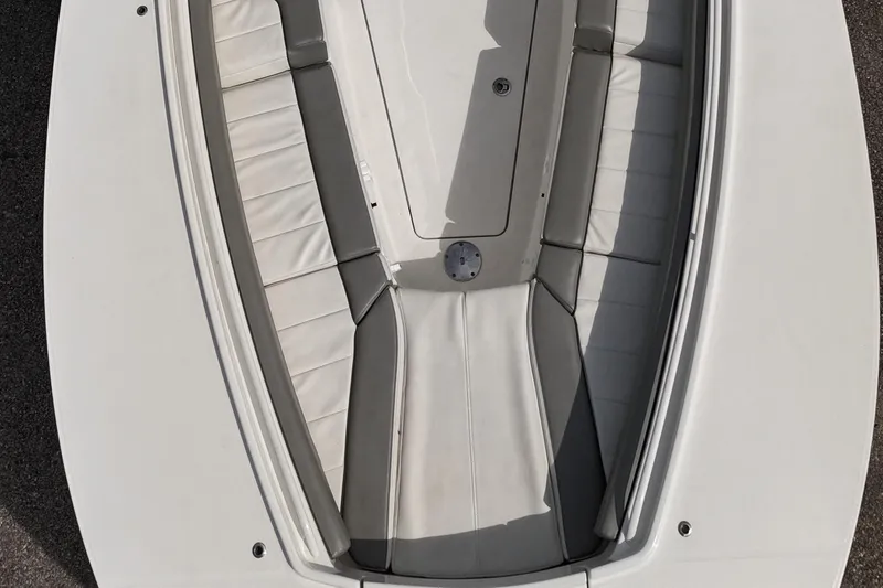 Slide: The Image of 2023 Regulator 28 boat interior with cushioned seating, top view. - 26