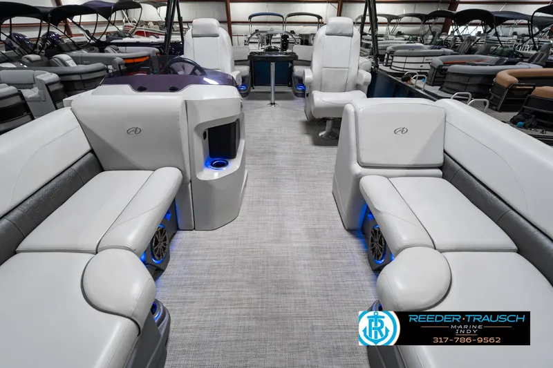 Slide: The Image of Luxurious 2020 Avalon 2485 boat interior with plush seating and ambient lighting. - 16