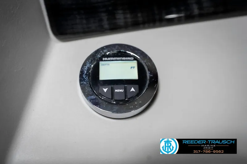 Slide: The Image of Digital display on 2020 Avalon 2485 boat dashboard, featuring Humminbird device. - 34