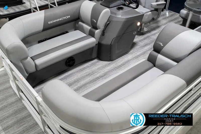 Slide: The Image of 2025 Bennington 18 SLJ pontoon boat interior with gray seating and modern console. - 12