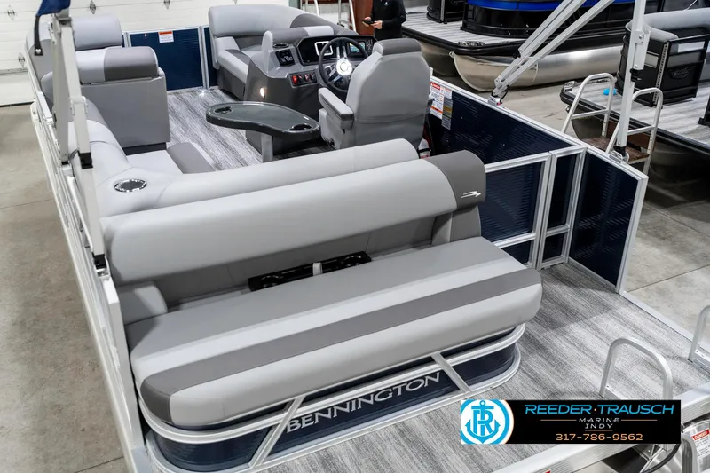Slide: The Image of 2025 Bennington 18 SLJ pontoon boat with gray seating and modern interior design. - 15