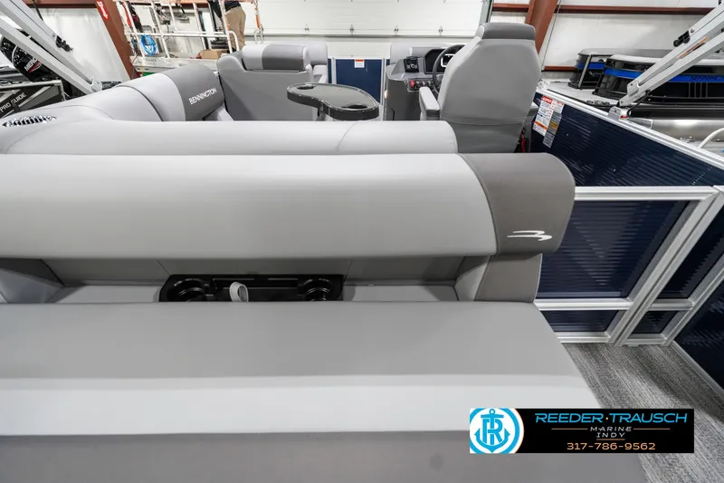 Slide: The Image of 2025 Bennington 18 SLJ pontoon boat interior with gray seating and modern design. - 19