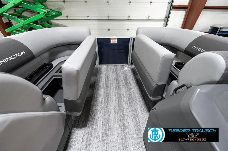 Slide: The Image of 2025 Bennington 18 SLJ pontoon boat interior with gray seating and flooring. - 22