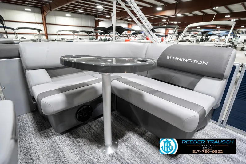 Slide: The Image of 2025 Bennington 18 SLJ pontoon boat interior with gray seating and table. - 25