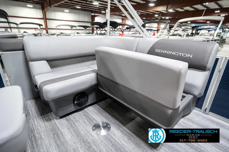 Slide: The Image of 2025 Bennington 18 SLJ pontoon boat interior with gray seating and carpeted flooring. - 28