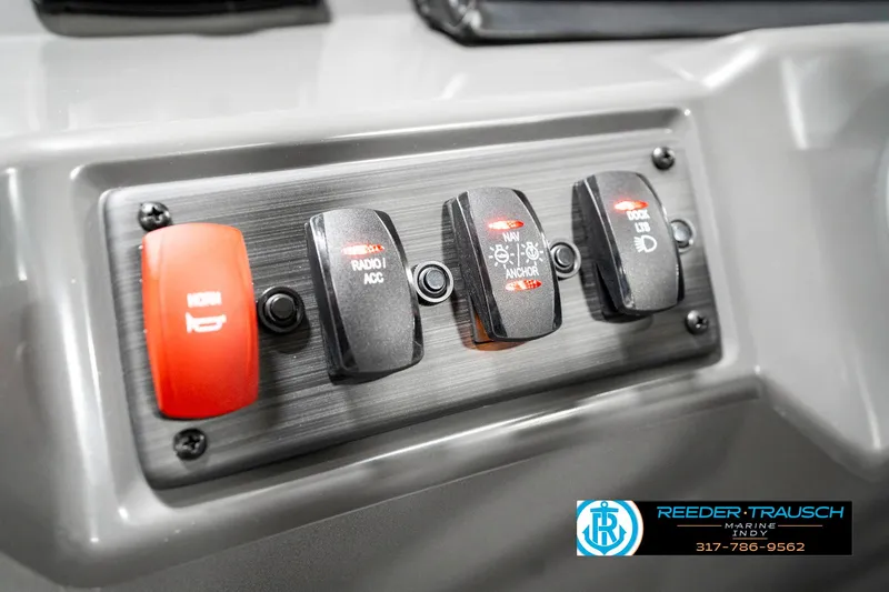 Slide: The Image of Control panel of 2025 Bennington 18 SLJ boat with labeled switches. - 35