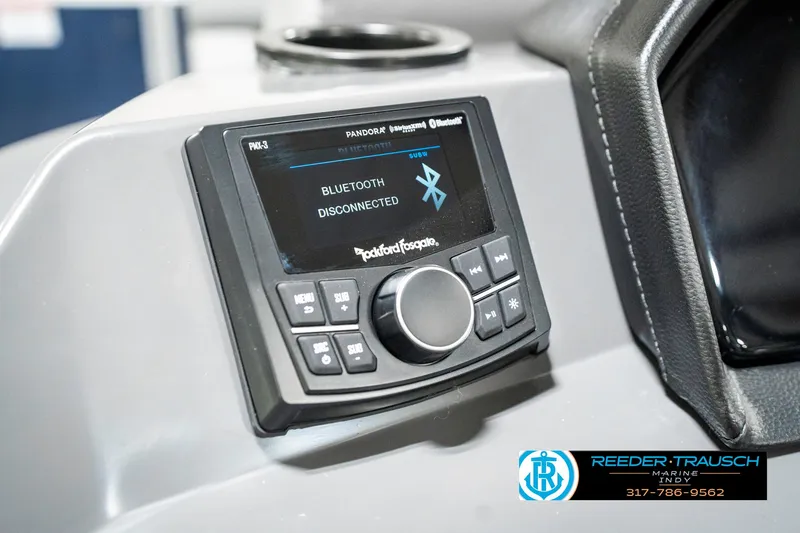 Slide: The Image of Control panel of 2025 Bennington 18 SLJ with Bluetooth display, Reeder-Trausch branding. - 36