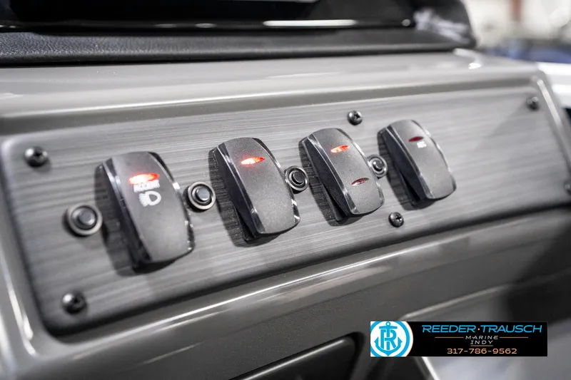 Slide: The Image of Control panel of 2025 Bennington 18 SLJ boat with labeled switches. - 39