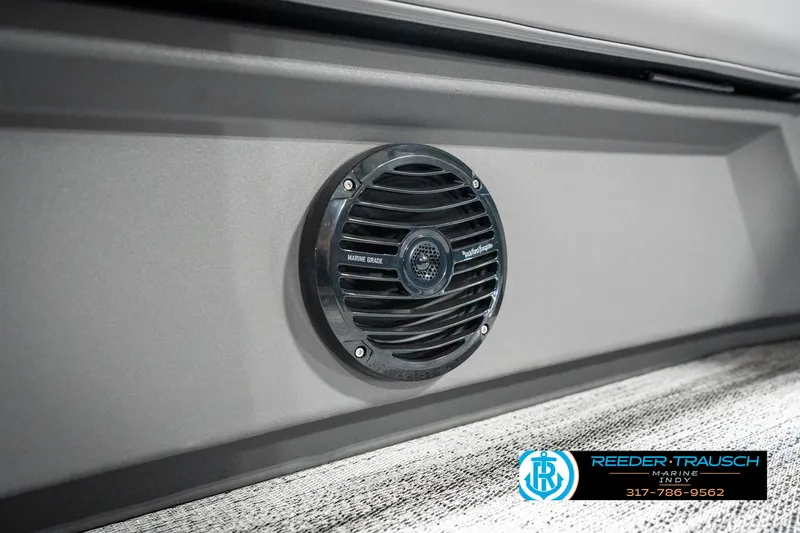 Slide: The Image of 2025 Bennington 18 SLJ boat speaker detail with Reeder-Trausch Marine logo. - 44