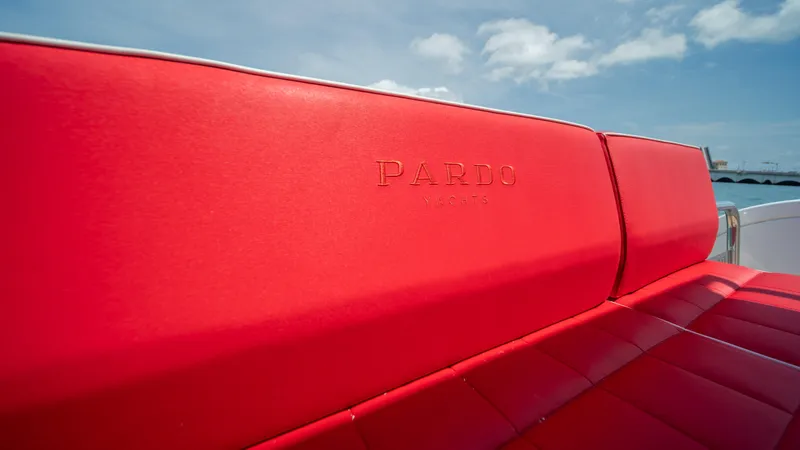 Slide: The Image of Red leather seating on 2023 Pardo Yachts 38 under blue sky. - 21