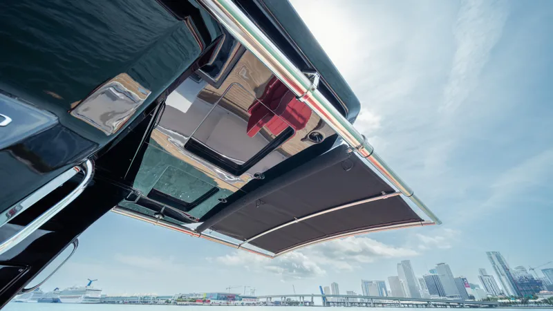 Slide: The Image of 2023 Pardo Yachts 38 with sleek design, city skyline in background. - 29