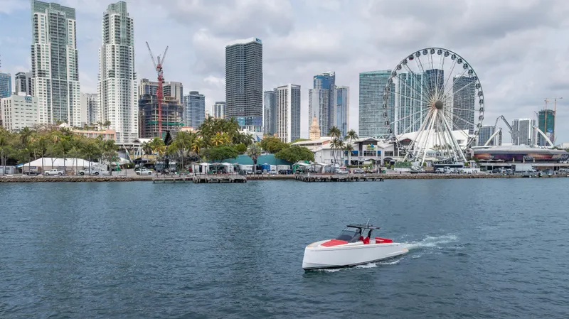Slide: The Image of 2023 Pardo Yachts 38 cruising near city skyline and Ferris wheel. - 8