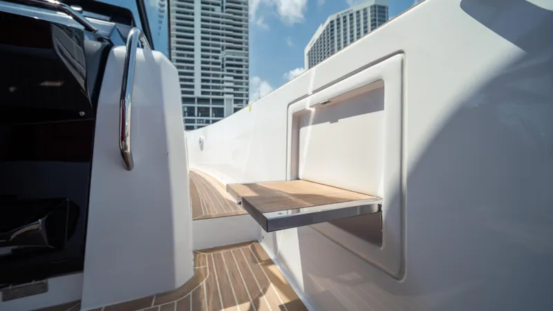 Slide: The Image of 2023 Pardo Yachts 38 with sleek deck design and modern amenities. - 12