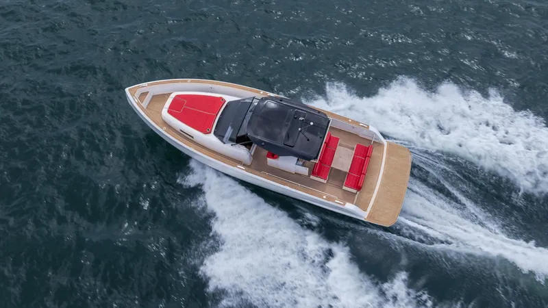 Slide: The Image of 2023 Pardo Yachts 38 cruising on open water, aerial view. - 2
