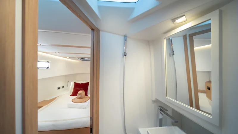 Slide: The Image of Luxurious cabin interior of 2023 Pardo Yachts 38, featuring modern design and cozy bedding. - 32
