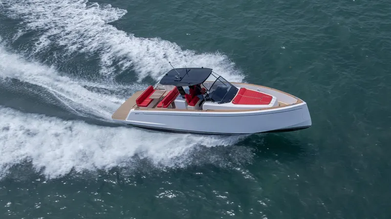 Slide: The Image of 2023 Pardo Yachts 38 cruising on water, featuring sleek design and red seating. - 47