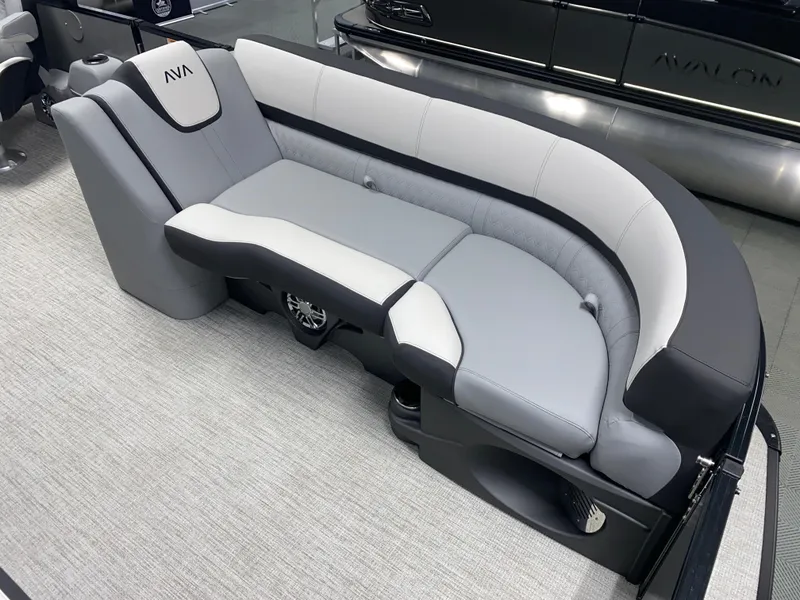 Slide: The Image of 2025 Avalon Catalina 2385 QL Tritoon interior with sleek, modern seating design. - 11