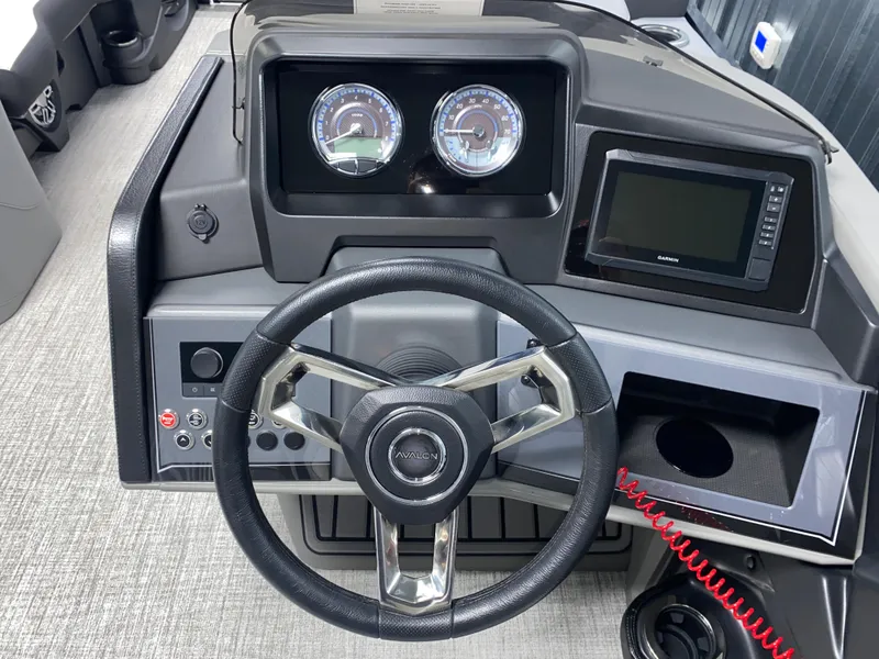 Slide: The Image of Steering console of 2025 Avalon Catalina 2385 QL Tritoon with gauges and display. - 8