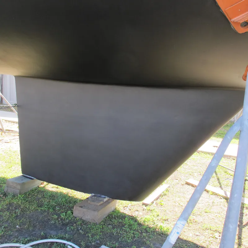 Slide: The Image of Bottom view of a 1999 Catalina 42 MkII sailboat hull on supports. - 20