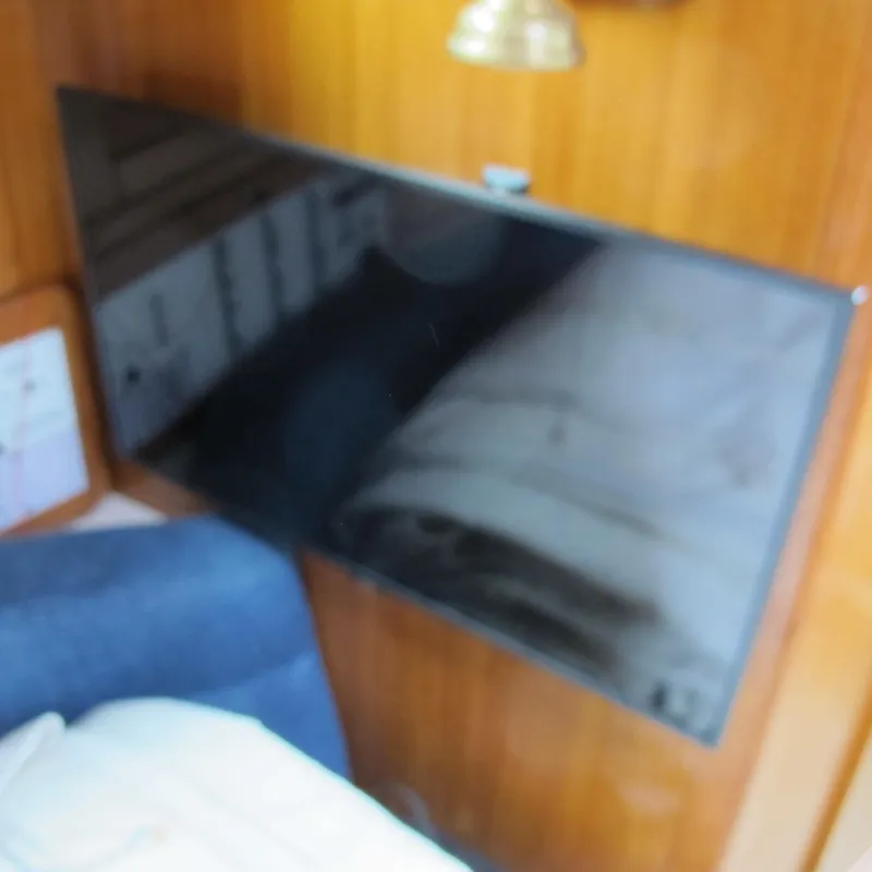 Slide: The Image of Interior of 1999 Catalina 42 MkII yacht with mounted flat-screen TV. - 29
