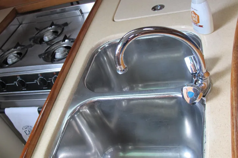 Slide: The Image of Double sink and stove in 1999 Catalina 42 MkII yacht kitchen. - 33