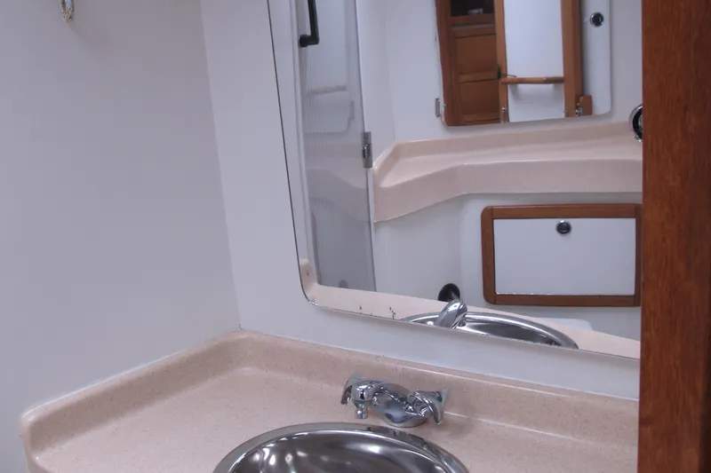 Slide: The Image of Bathroom interior of 1999 Catalina 42 MkII yacht with sink and mirror. - 40