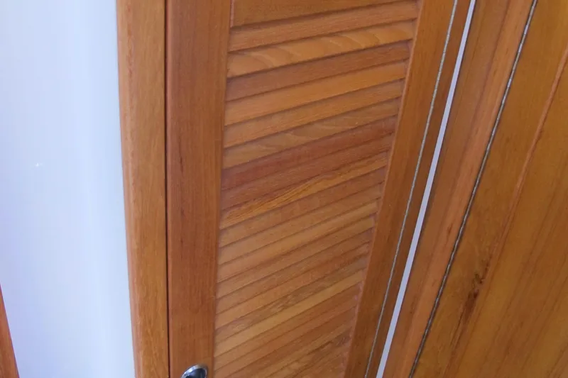 Slide: The Image of Wooden louvered door on a 1999 Catalina 42 MkII sailboat. - 42