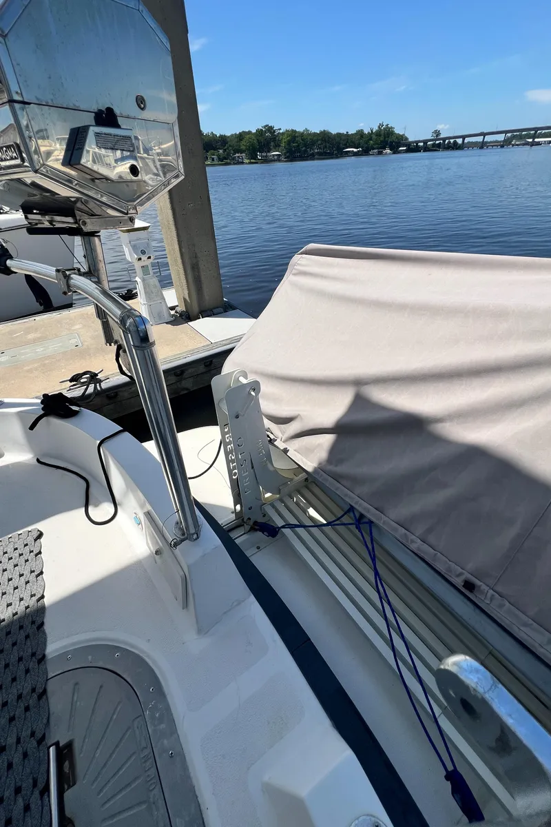 Slide: The Image of 2007 Great Harbour N47 boat docked by a serene waterfront. - 21