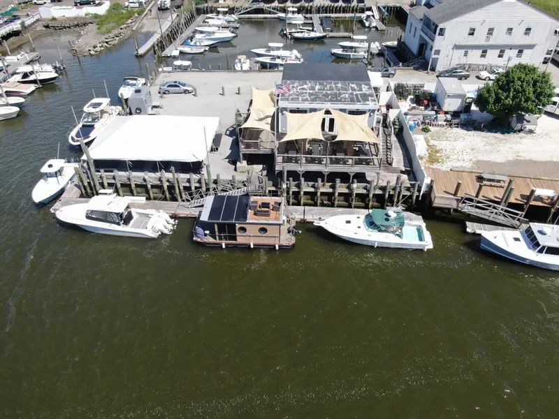 Slide: The Image of Solar panels on Waterlodge Apart M 2024, eco-friendly energy solution. - 30