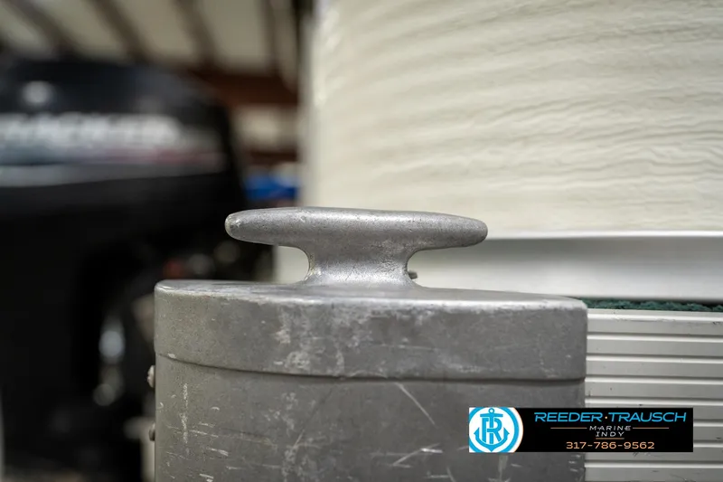 Slide: The Image of Close-up of a 1998 Odyssey 25 boat cleat with blurred background. - 43