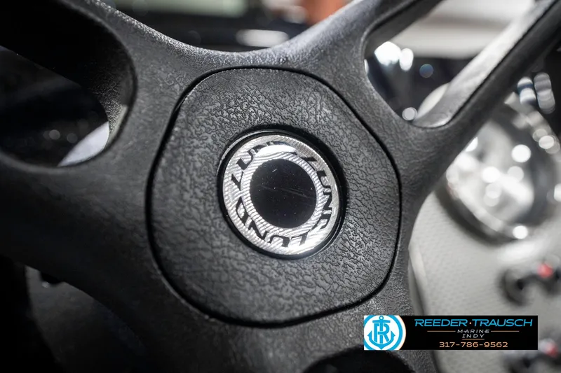 Slide: The Image of Close-up of 2025 Lund 1775 Renegade steering wheel with logo detail. - 31