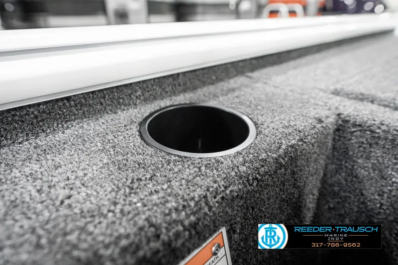 Slide: The Image of 2025 Lund 1775 Renegade boat interior with cup holder detail. - 37