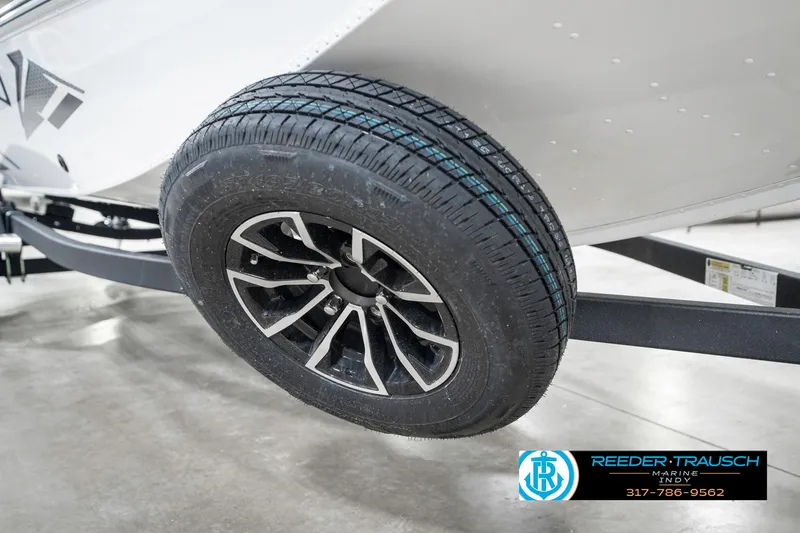 Slide: The Image of 2025 Lund 1775 Renegade trailer wheel with stylish black and silver rim design. - 48