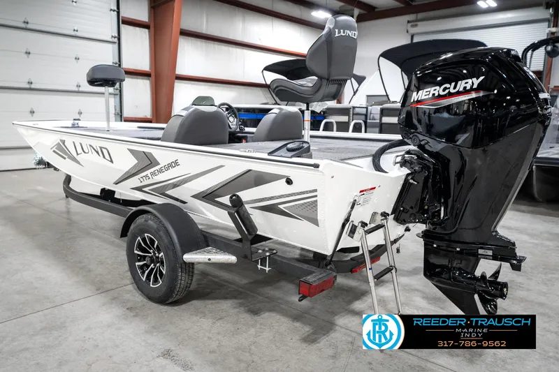 Slide: The Image of 2025 Lund 1775 Renegade boat with Mercury engine in a garage setting. - 8