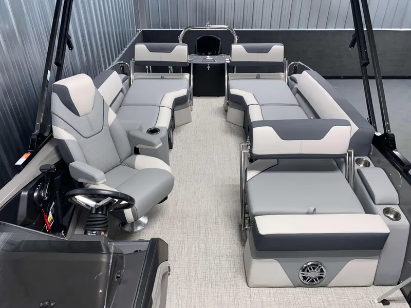 Slide: The Image of 2025 Avalon Catalina 2385 QLS Tritoon interior with luxurious seating and modern design. - 12