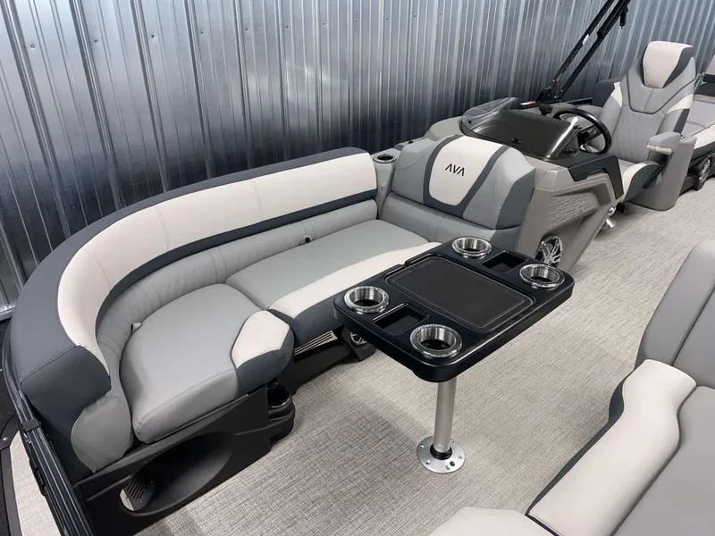 Slide: The Image of Luxurious interior of 2025 Avalon Catalina 2385 QLS Tritoon with plush seating and cup holders. - 15