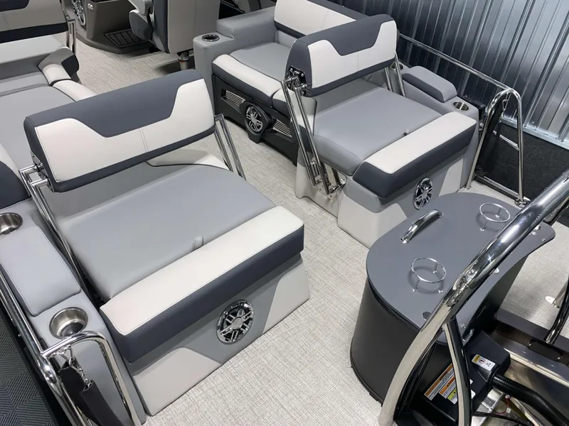 Slide: The Image of 2025 Avalon Catalina 2385 QLS Tritoon interior with luxurious seating and modern design. - 3