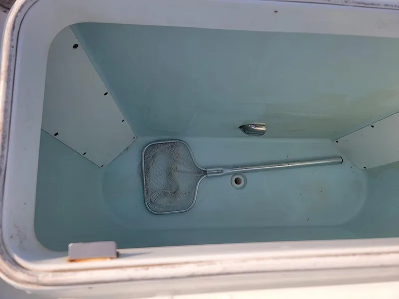 Slide: The Image of Open livewell with net inside, Yellowfin 36 boat, 2014 model. - 18