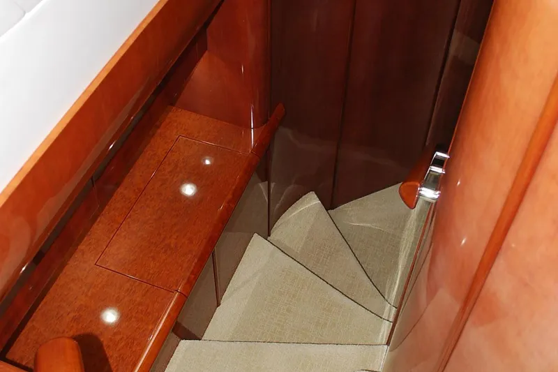 Slide: The Image of Staircase with wooden paneling on a 2000 Fairline Squadron yacht. - 22