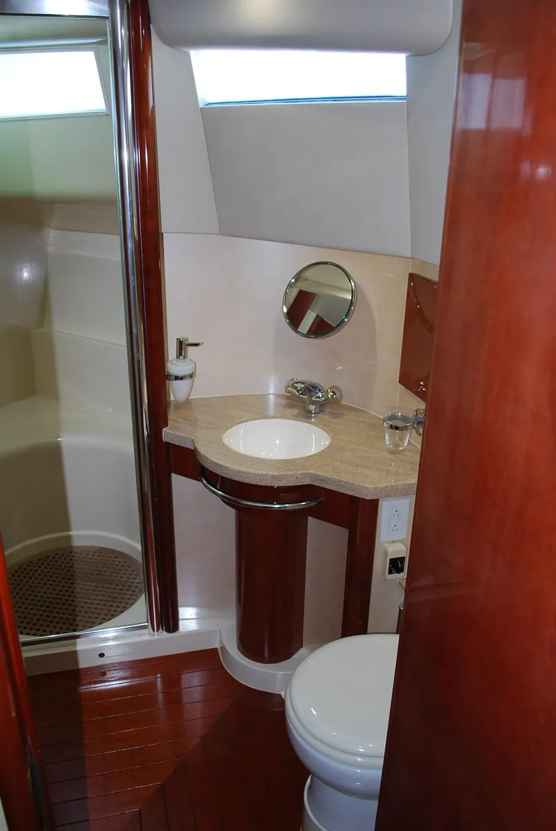 Slide: The Image of Luxurious bathroom in 2000 Fairline Squadron yacht with wood accents and modern fixtures. - 28