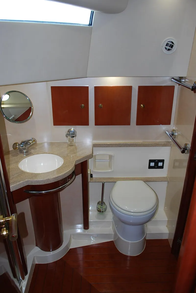 Slide: The Image of Fairline Squadron 2000 yacht bathroom with modern fixtures and wooden accents. - 29