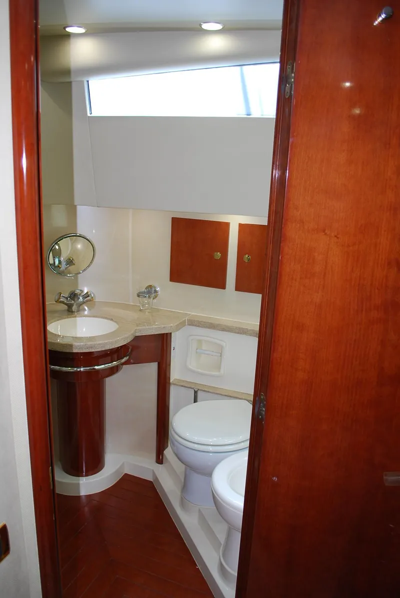 Slide: The Image of Luxurious bathroom in 2000 Fairline Squadron yacht with wooden accents and modern fixtures. - 33